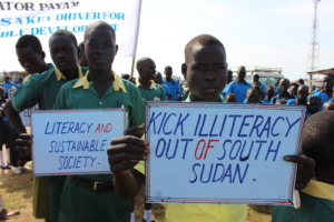 Students hold up signs at the ILD 2015 event