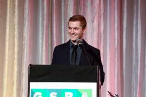 Greg speaking to the audience