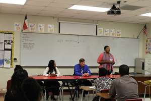 local business mentors speaking in a NFTE class