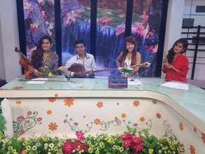 Samnang being interviewed on 'Happy World'