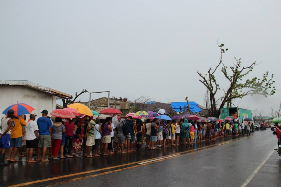 A long-line of survivors awaiting for relief