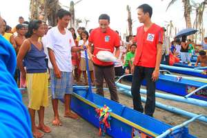 Fishing boats hand over to recipients