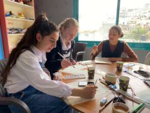 Young artists at work in Ibn Rushd