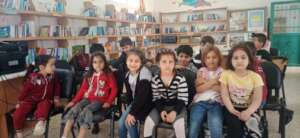 Children keenly listening to a story