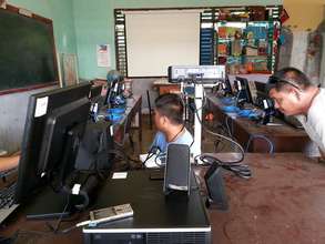 technicians install HP computers in e-classroom