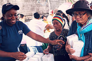 Distributing Hygiene Kits to Villagers