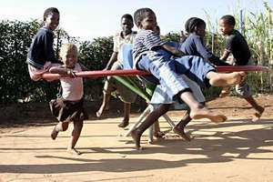 Kids having fun on the PlayPump Merry-Go-Round