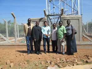 Nasir Uddin and Ugandan team visit water tower.