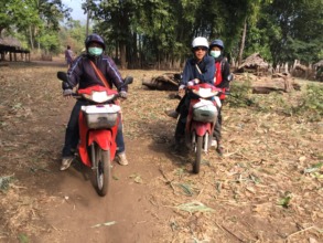 The boys on the bikes between villages