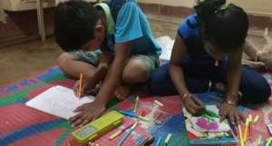 Children are engaged in doing art & colouring