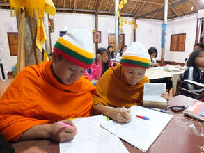 Local monks attending English class