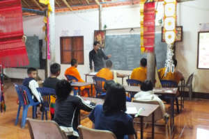 A lesson taking place in the local temple