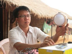 Sai Oo practices using the solar light from TBF
