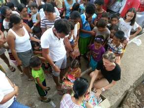Handing out books in Coron, Palawan