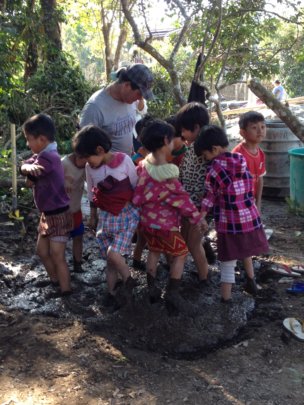 Kachin students making bricks for their school