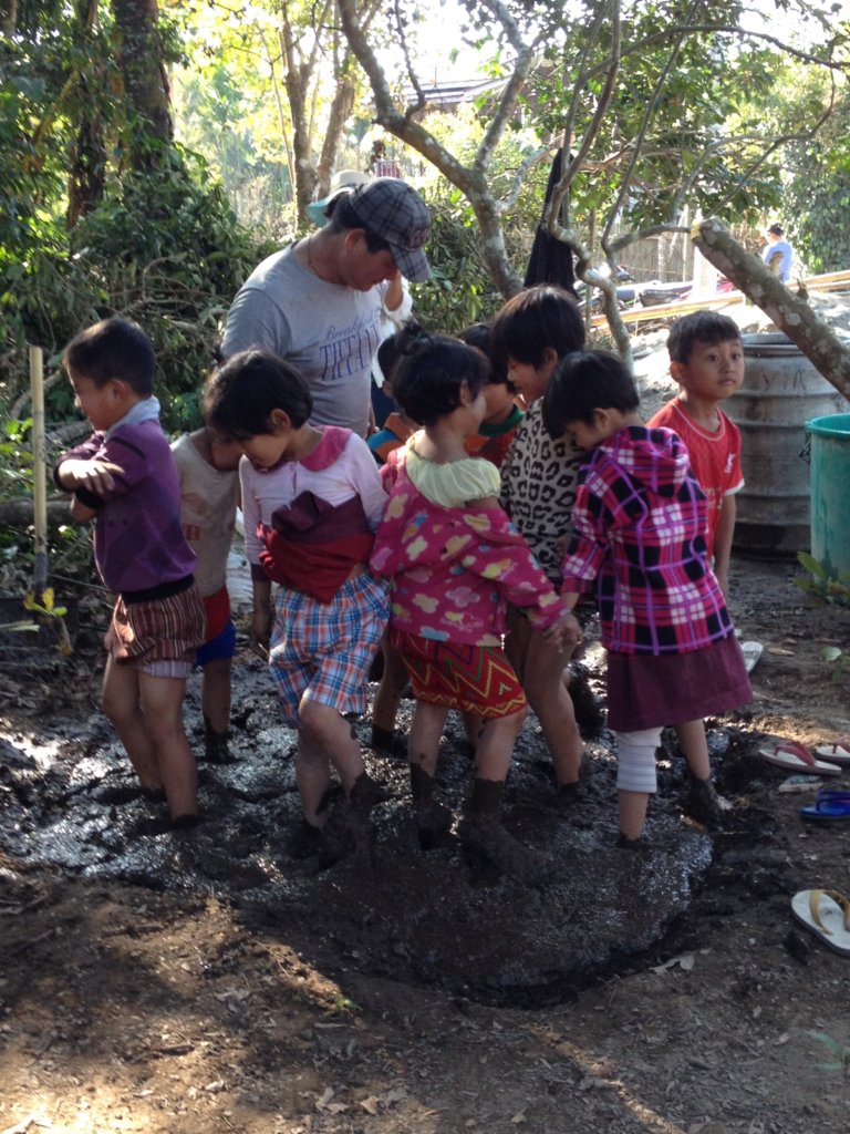 Kachin students making bricks for their school