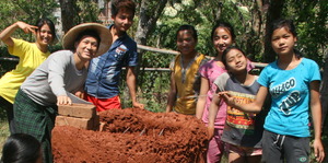 Saya Naw Zet and Shalat students earthen oven