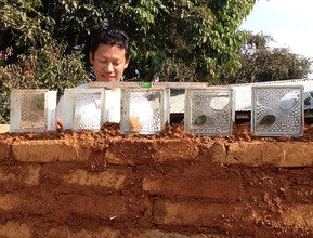 Happy director of new mud kindergarten school