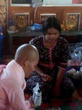 Aye Aung teaching at Buddhist monastery school