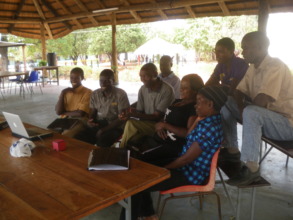 CHWs watching training video