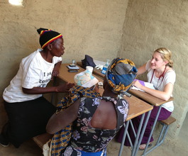 CHW, Conista, translating for Dr. Carloine
