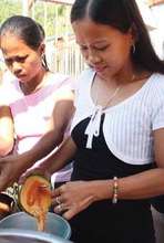 Mothers learning about nutrition at WV center