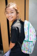 A smiling face ready for school!