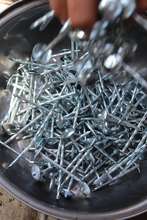 Roofing nails to repair homes after the typhoon