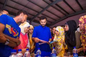 Spreeha's students present a specially made card