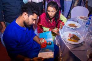 Mashrafe learning about program details at Spreeha