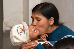 a mother and a child from the project