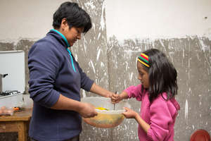 Mother and child preparing healthy nutrition
