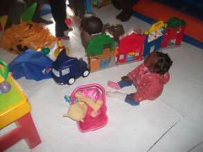 Babies interacting with toys