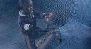 Under mosquito net