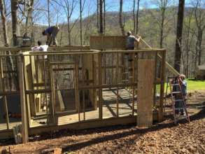 Building Goodness volunteers create new aviary.