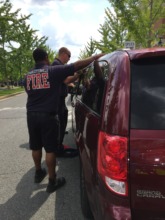 Firefighters rescuing swifts from locked car
