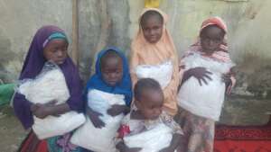 Girls giving nets