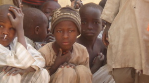 Children listening to a talk on sleeping under ITN