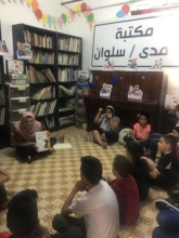 Tala with the children at Madaa Creative Center