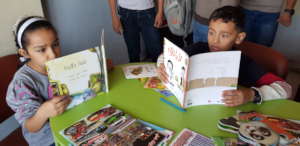 Children enjoy reading their books at ESPL