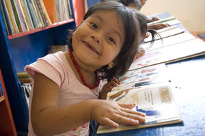 A reading Little girl