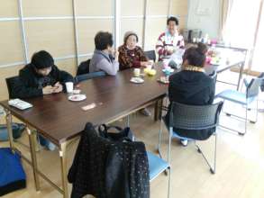 Children talk with the elderly