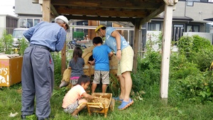 We repaired the earth oven which was built in May