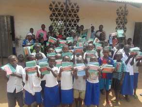 Rwenena students display math kits and notebooks