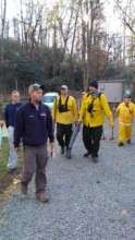 Some of the firefighters in driveway