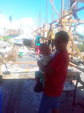 Former patient visiting re-building site