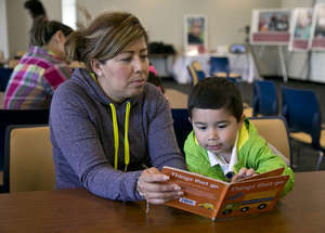 Parent and Child reading in Bay Area
