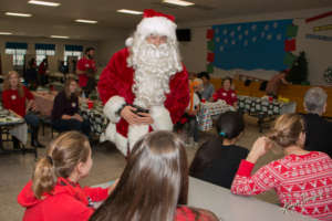 Santa bringing gifts to our campers!