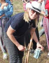 PhD student Alice setting up camera traps