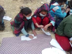 Girls Learn to make reusable sanitary pads-Bajura